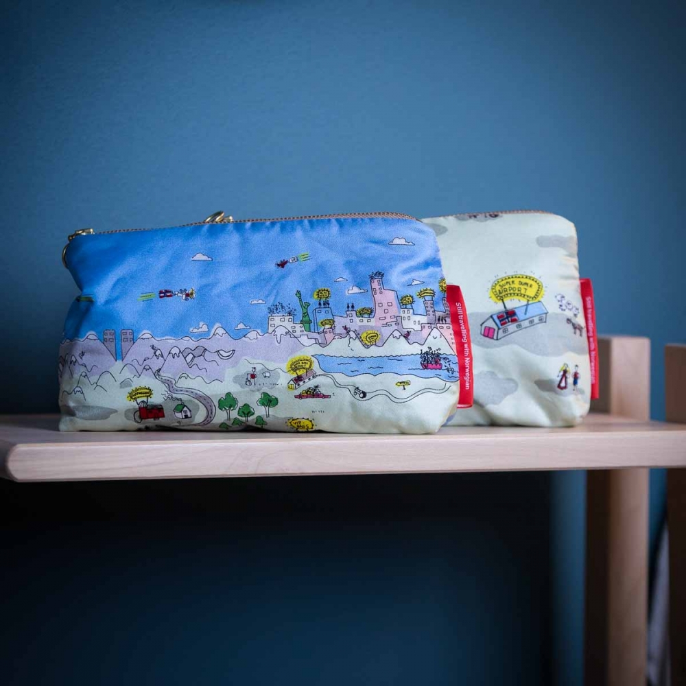 Nydelig sminkpung eller clutch som er fantastisk når du skal ha med deg de små viktige tingene